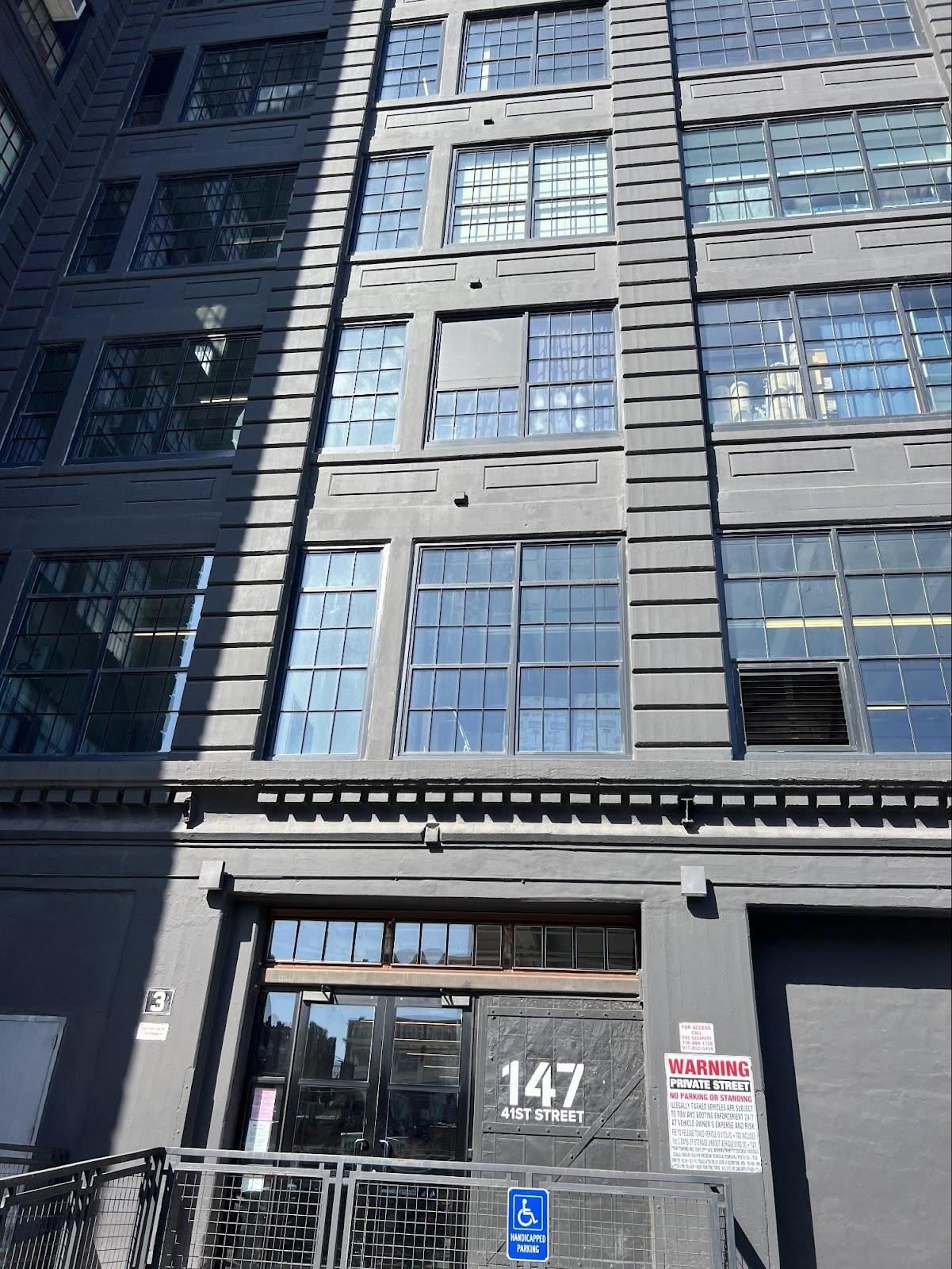 A building with many windows

Description automatically generated