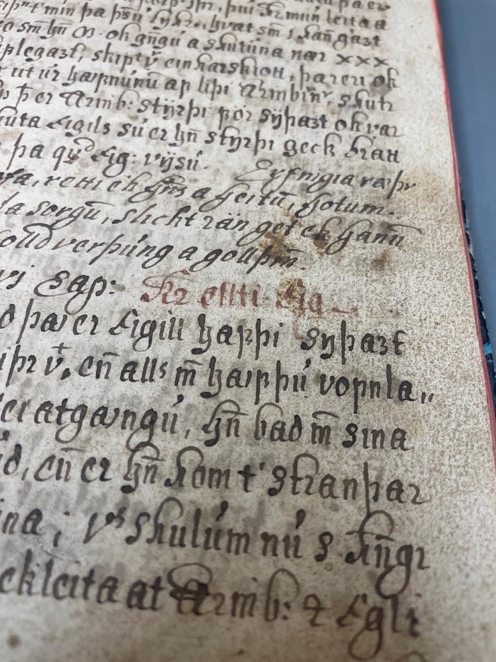 A close up of a book

Description automatically generated