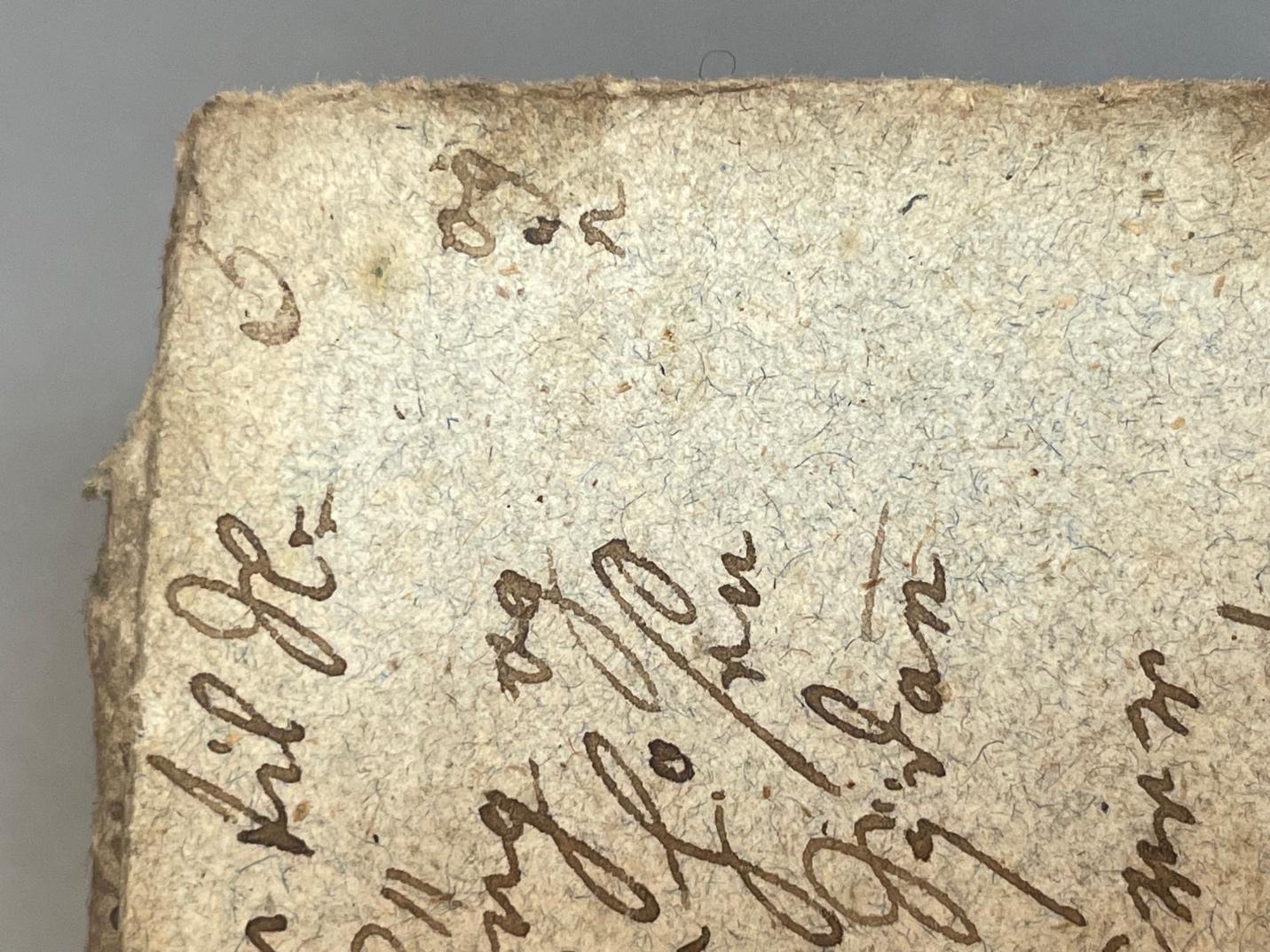 A close up of a piece of paper

Description automatically generated