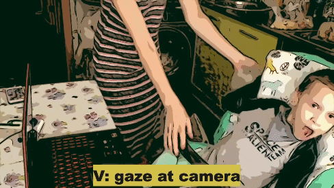 In this gif, Anastasia comes close to Ivan to move his chair closer to the desk. At this point, Ivan eye-points at the camera to comment on the situation that they are being video-recorded.
